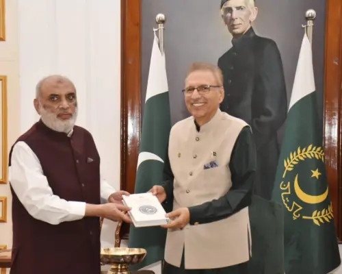 Professor Dr. Abdul Rashid receiving presidentail award from president arif ali